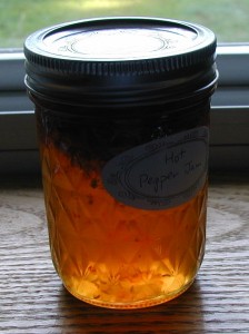 Most of the fruit rises to the top of the jelly jar.