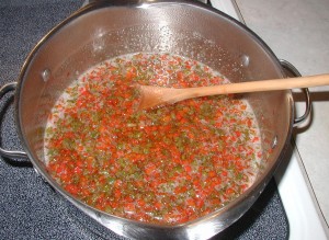 Peppers, vinegar and pectin with sugar added last.