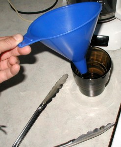 A funnel for jar-filling and tongs for grabbing lids and bands.