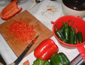 Preparing peppers for making jam.